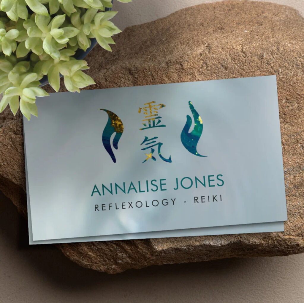 Healing hands with Reiki symbols on golden marble – elegant card for energy healing services.