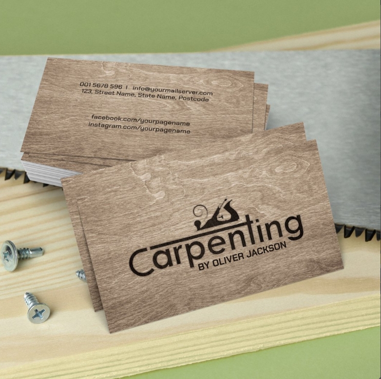 Rustic carpenter business card with saw and planer icons