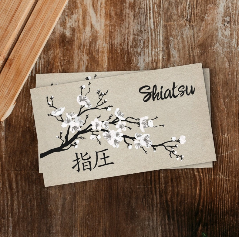 Massage therapy appointment card with healing hands graphic