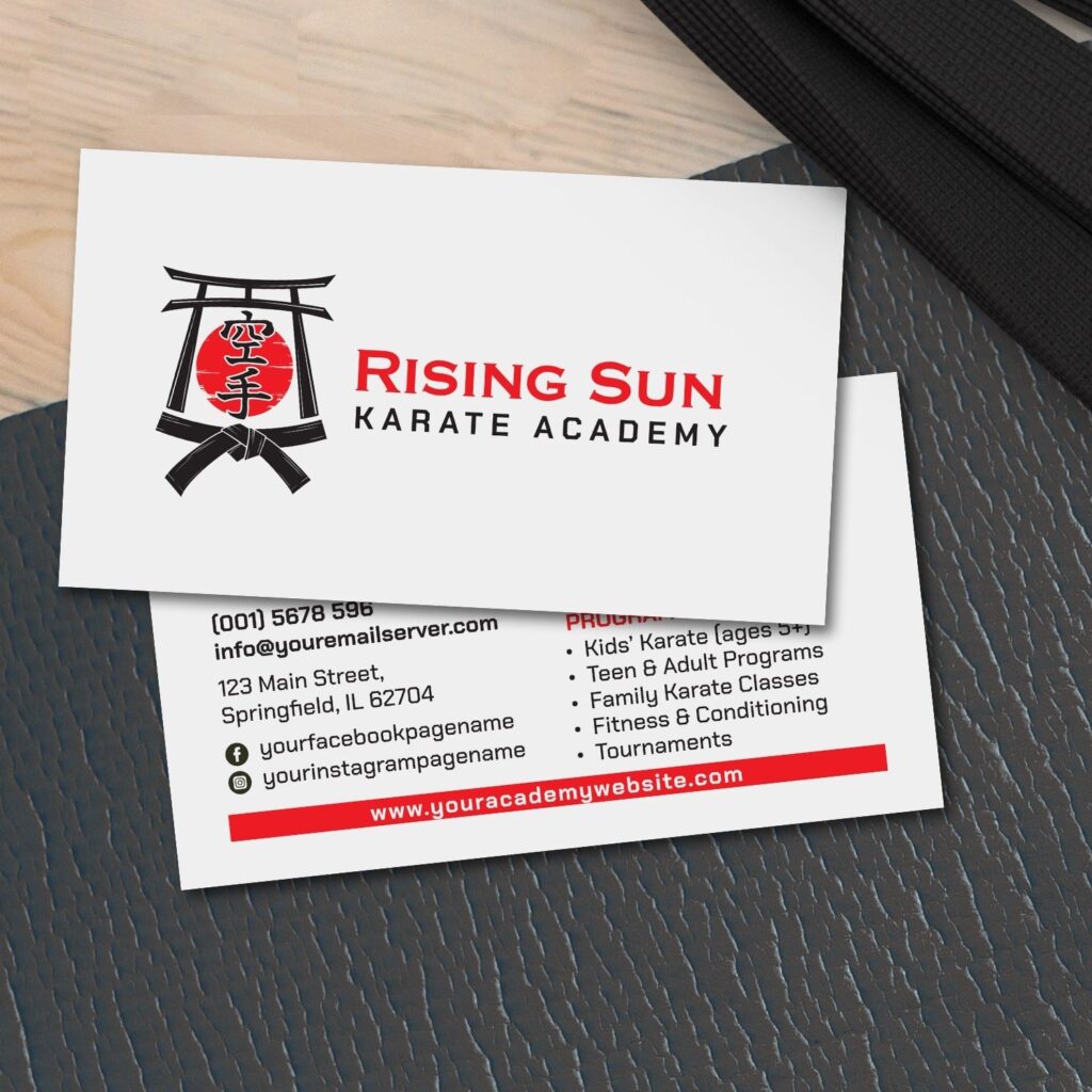 Karate academy business card with torii gate, sun, and kanji